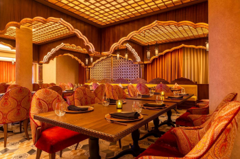 Interior of Agra Indian restaurant at Moon Palace Cancun with ornate decor and warm ambient lighting<