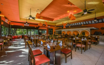 Rincón Mexicano restaurant at El Dorado
Royale Riviera Maya featuring traditional décor and indoor dining inspired by
authentic Mexican cuisine.