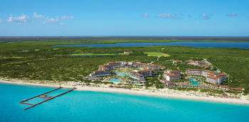 Aerial view of Dreams Playa Mujeres resort along the white sand coastline of Playa Mujeres, Mexico Aerial view of Dreams Playa Mujeres resort along the white sand coastline of Playa Mujeres, Mexico