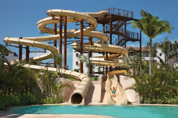 Spiral water slide tower at the Dreams Playa Mujeres waterpark Spiral water slide tower at the Dreams Playa Mujeres waterpark